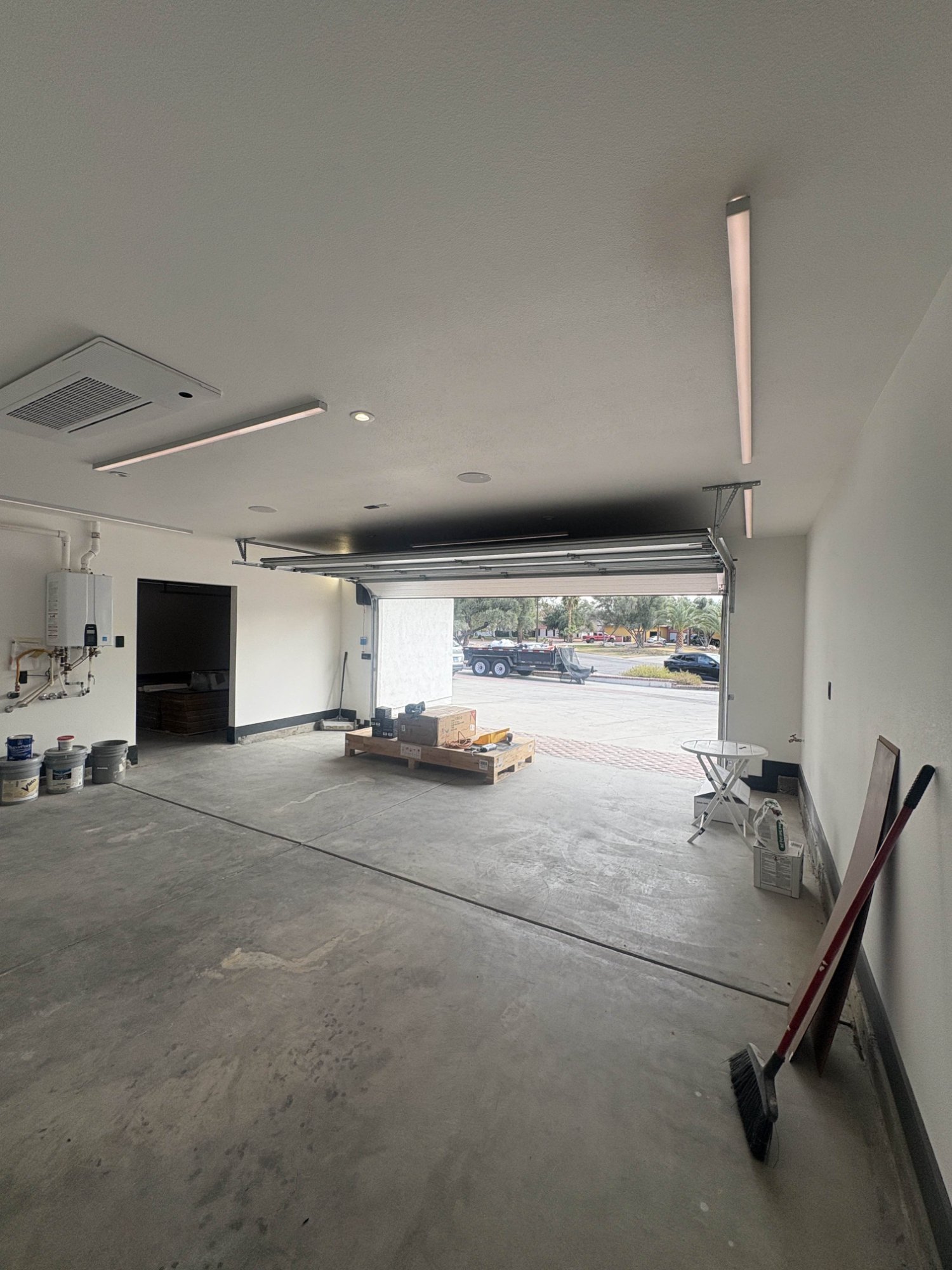 Before photo - Garage walls before drywall installation in Las Vegas